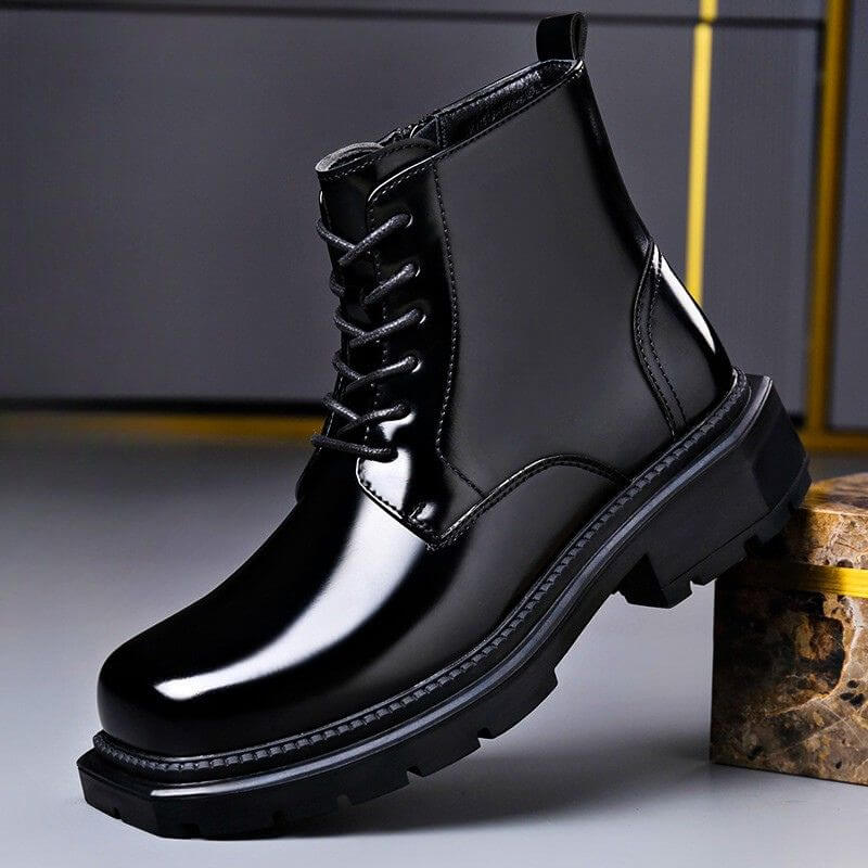 Onyx black high-gloss lace up boots with a chunky lug sole, side view