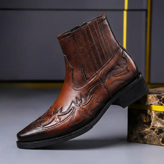 Cognac brown Western Chelsea boots with pointed toe, tooled overlay and elastic side panel