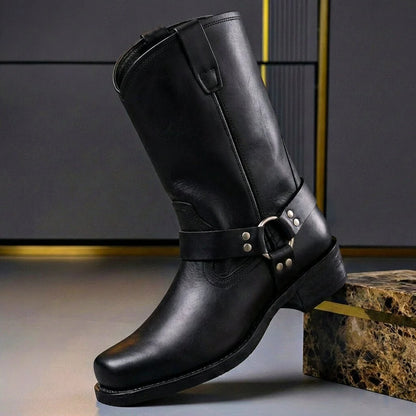 Obsidian black harness boots with a metal ring strap and low block heel